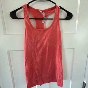 Lululemon racerback tank top light coral - size 4.